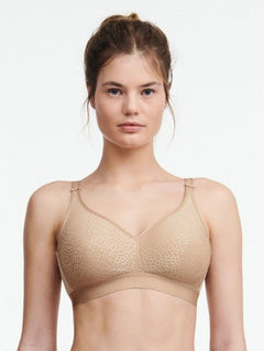Front view of Chantelle C Magnifique Non Wire Bra in Nude featuring floral jacquard cups and adjustable straps.