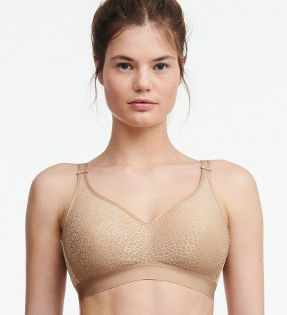 Front view of Chantelle C Magnifique Non Wire Bra in Nude featuring floral jacquard cups and adjustable straps.