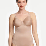 Model in Chantelle Hedona Bodysuit Nude, full front view showing seamless cups and tummy-smoothing fit, shapewear from The Foundation.