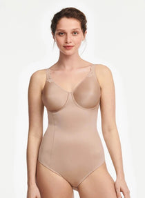 Model in Chantelle Hedona Bodysuit Nude, full front view showing seamless cups and tummy-smoothing fit, shapewear from The Foundation.