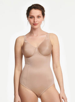 Model in Chantelle Hedona Bodysuit Nude, full front view showing seamless cups and tummy-smoothing fit, shapewear from The Foundation.