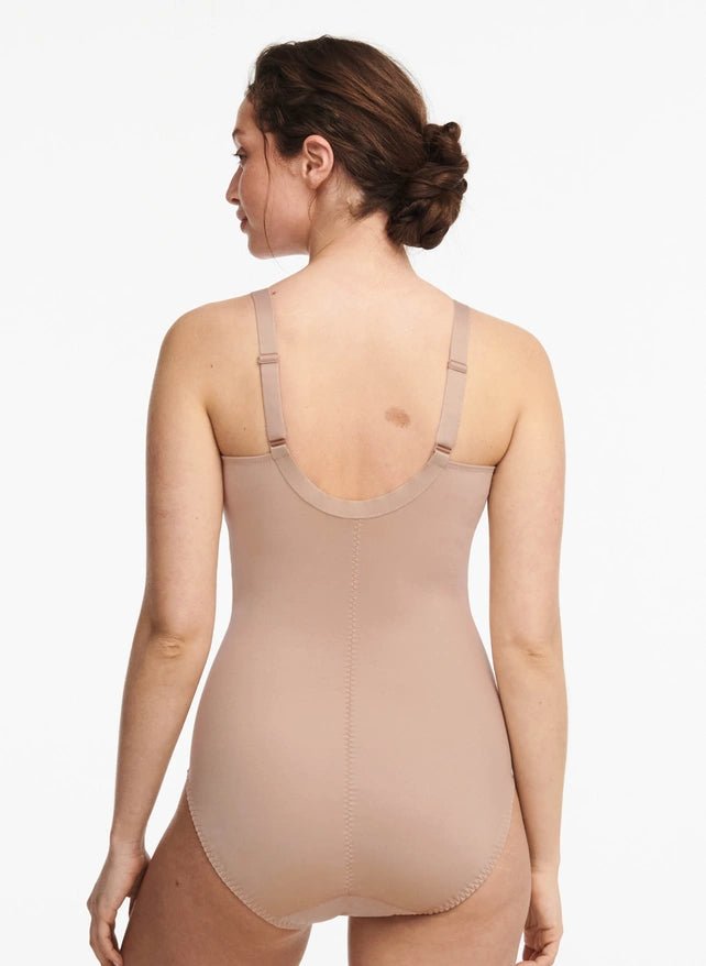 Back view of Chantelle Hedona Bodysuit Nude on model, highlighting medium control shaping and invisible seams, available at The Foundation.