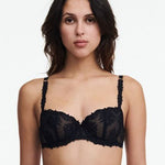 Front view of The Foundation’s Champs Elysees Half Cup Balcony Bra in Black, showcasing sheer embroidered tulle and unlined cups.