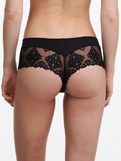 Back view of The Foundation’s Champs Elysées Revealing Shorty Brief in Black, showcasing sheer lace and cheeky back coverage.