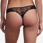 Back view of The Foundation’s Chantelle Tanga Brief in Black, highlighting minimal mesh coverage and a delicate lace trim.