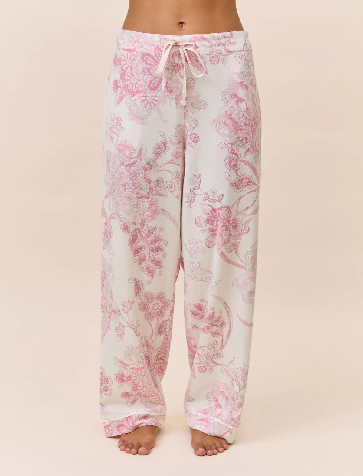 Papinelle Coco Feather Soft PJ Set in Pink and Ecru, featuring a long sleeve scoop neck top and relaxed wide-leg floral pants – available at The Foundation.
