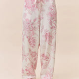 Papinelle Coco Feather Soft PJ Set in Pink and Ecru, featuring a long sleeve scoop neck top and relaxed wide-leg floral pants – available at The Foundation.