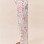 Papinelle Coco Feather Soft PJ Set in Pink and Ecru, featuring a long sleeve scoop neck top and relaxed wide-leg floral pants – available at The Foundation.