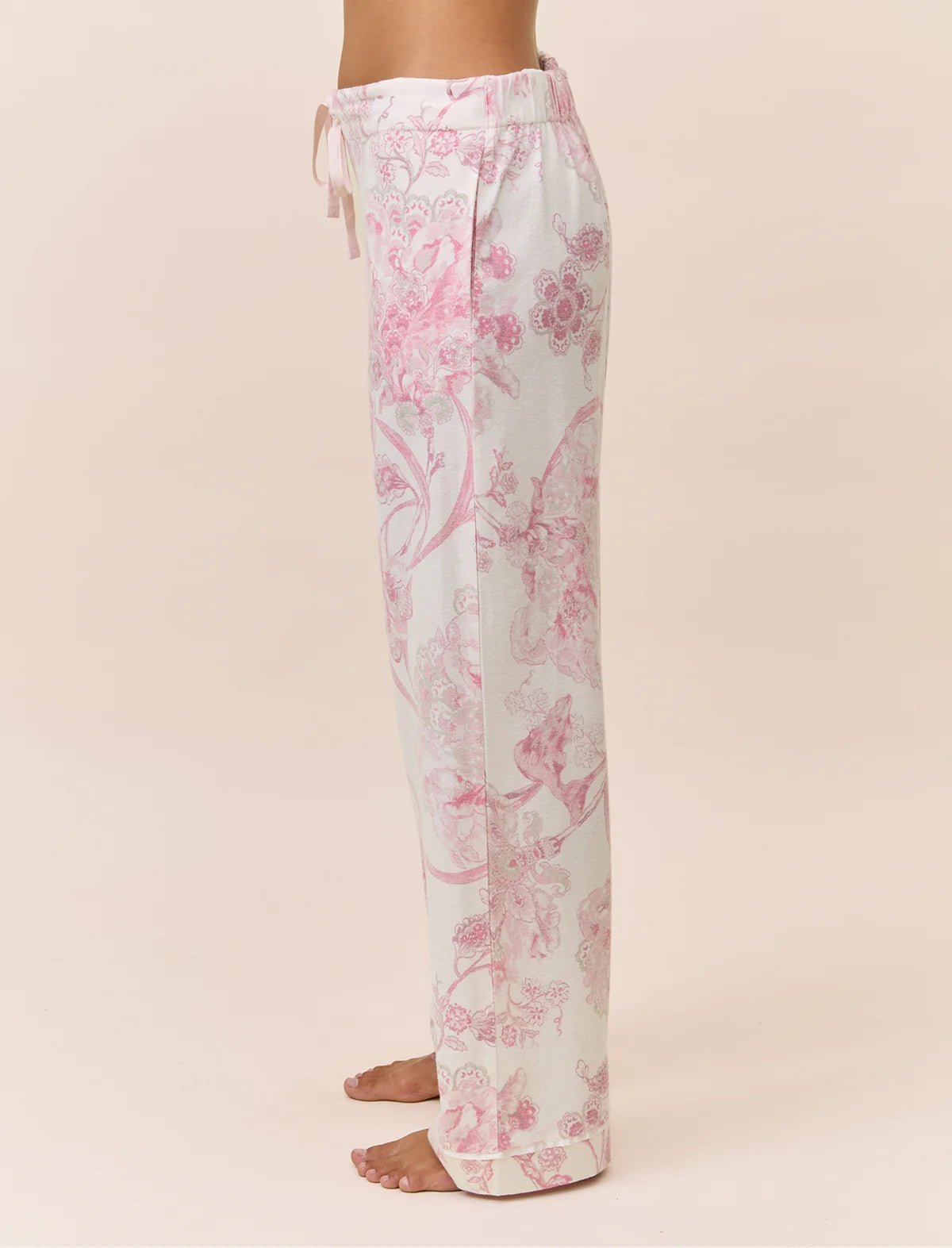 Papinelle Coco Feather Soft PJ Set in Pink and Ecru, featuring a long sleeve scoop neck top and relaxed wide-leg floral pants – available at The Foundation.