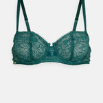 Flat lay of Chantelle Day to Night Half Cup Bra in green lace – demi cut lingerie from The Foundation