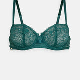 Flat lay of Chantelle Day to Night Half Cup Bra in green lace – demi cut lingerie from The Foundation