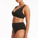 Sea Level Essentials Gathered Side High Waist Swim Pant in Black with ruched sides, high rise waist, and full bottom coverage – available at The Foundation