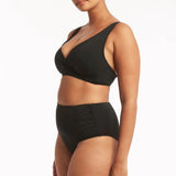 Sea Level Essentials Gathered Side High Waist Swim Pant in Black with ruched sides, high rise waist, and full bottom coverage – available at The Foundation