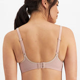 Studio back view of Electrify Mesh Underwire Sports Bra Soft Powder, showing adjustable straps and fit from The Foundation.