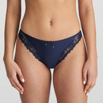 Model wearing the Jane Italian Brief in Velvet Blue with sheer floral embroidery and velvet waistband.