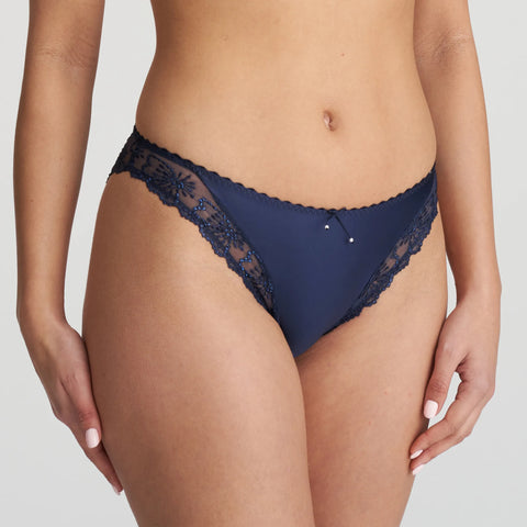 Side profile of the Jane Italian Brief showing elegant leg-cut design and floral embroidery.