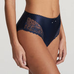 Side view of the Jane Full Brief in Velvet Blue, highlighting embroidered lace leg panels.