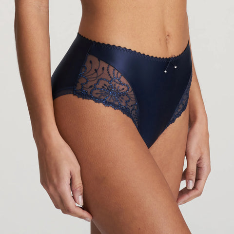 Side view of the Jane Full Brief in Velvet Blue, highlighting embroidered lace leg panels.