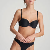 Model wearing Marie Jo Tom Convertible Bra in Charcoal—elegant everyday support.