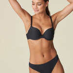 Model wearing Tom Rio Brief with matching Charcoal bra set from The Foundation—effortless, timeless lingerie styling.