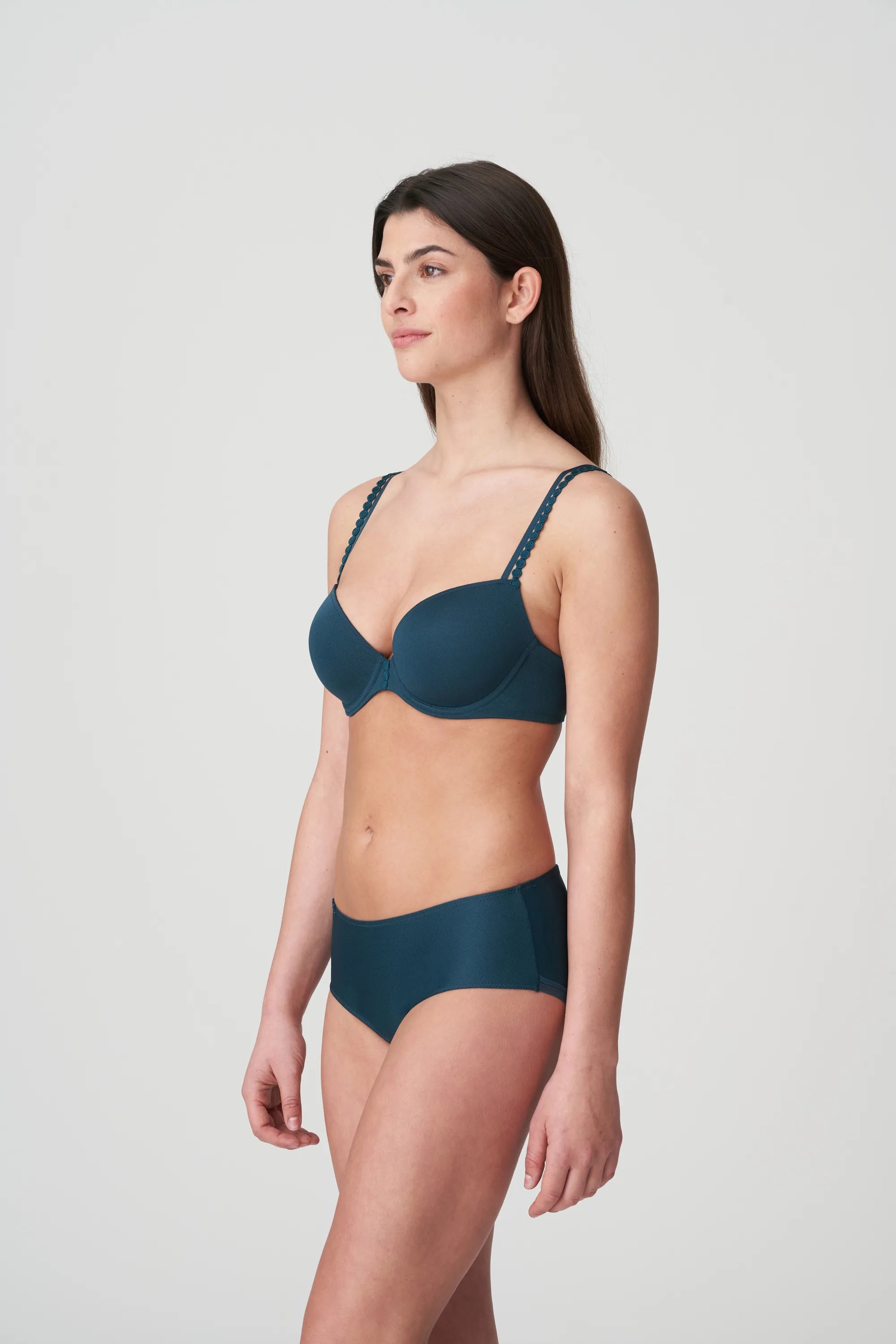 Model wearing Tom Mini Padded Plunge Bra in Empire Green, demonstrating flattering fit for all skin tones