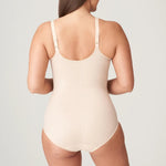 Back view of the PrimaDonna Deauville Bodysuit in Café Latte, showing adjustable straps and smoothing coverage, stocked at The Foundation.