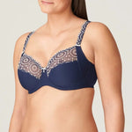 Side angle of Osino Full Cup Bra Sapphire Blue, highlighting eyelet lace detail on the straps and cups