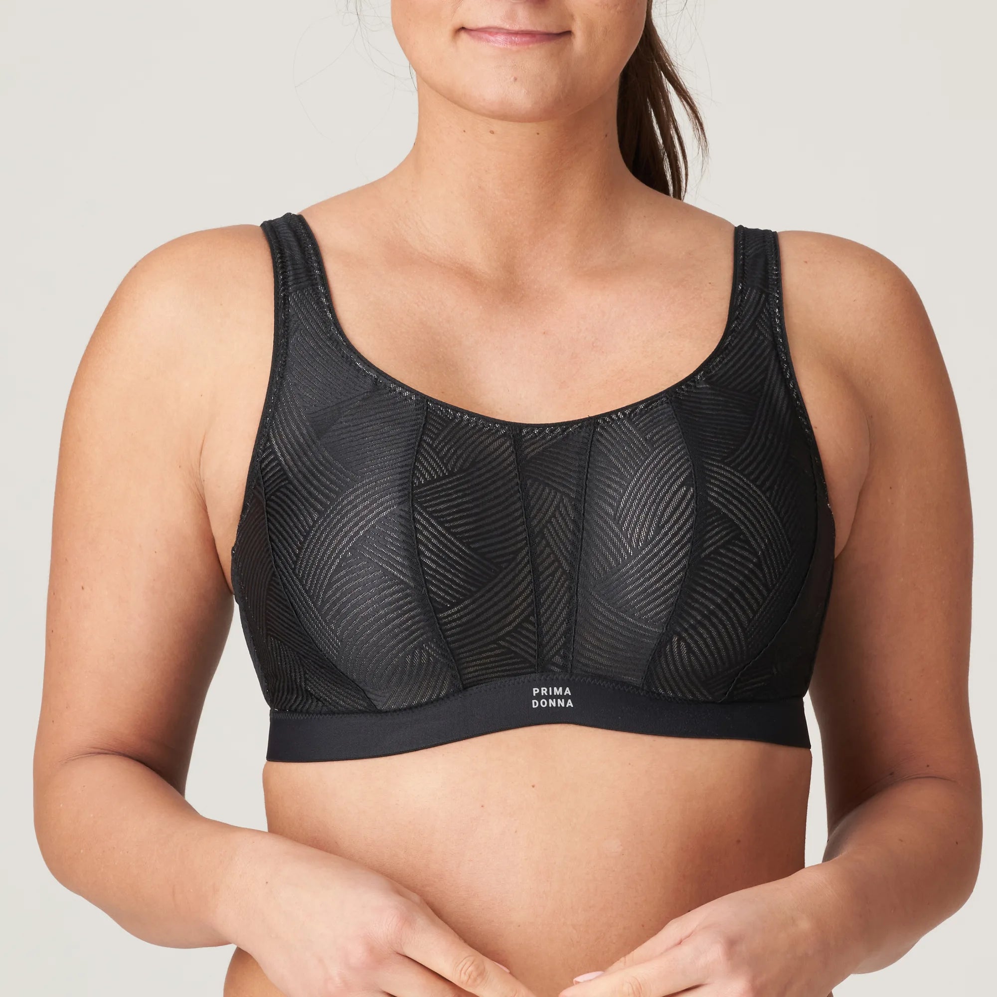 PrimaDonna The Game Sports Bra Black – front view showing full coverage and sleek, supportive fit for high-impact workouts.