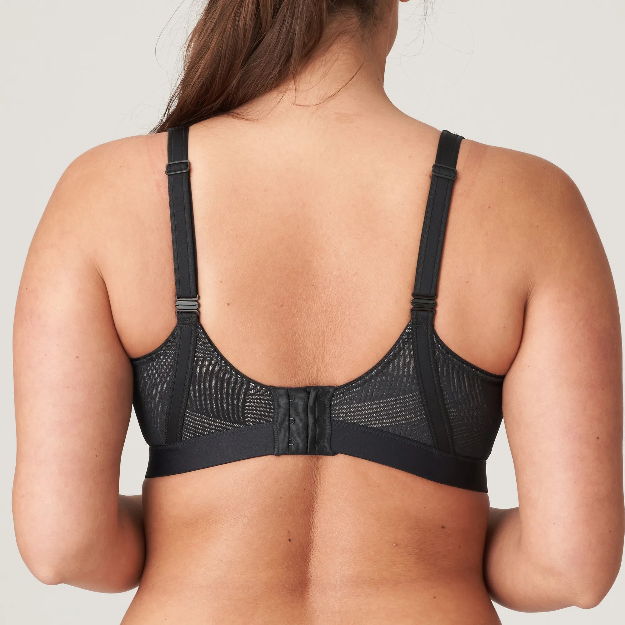 Back view of The Game Sports Bra Black by PrimaDonna – standard strap configuration with breathable mesh detail.