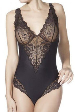 Front view of Model wearing Janira Greta IM Lace Bodysuit in Black, showcasing intricate lace detail and flattering silhouette.