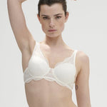 Front view of Karma 3D Moulded Bra in natural by Simone Perele, featuring scalloped lace and breathable cups—shop now at The Foundation.