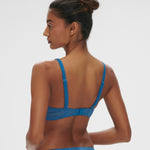 Back angle of the Karma Triangle Bra showing multiway straps and delicate lace band for a barely-there feel.