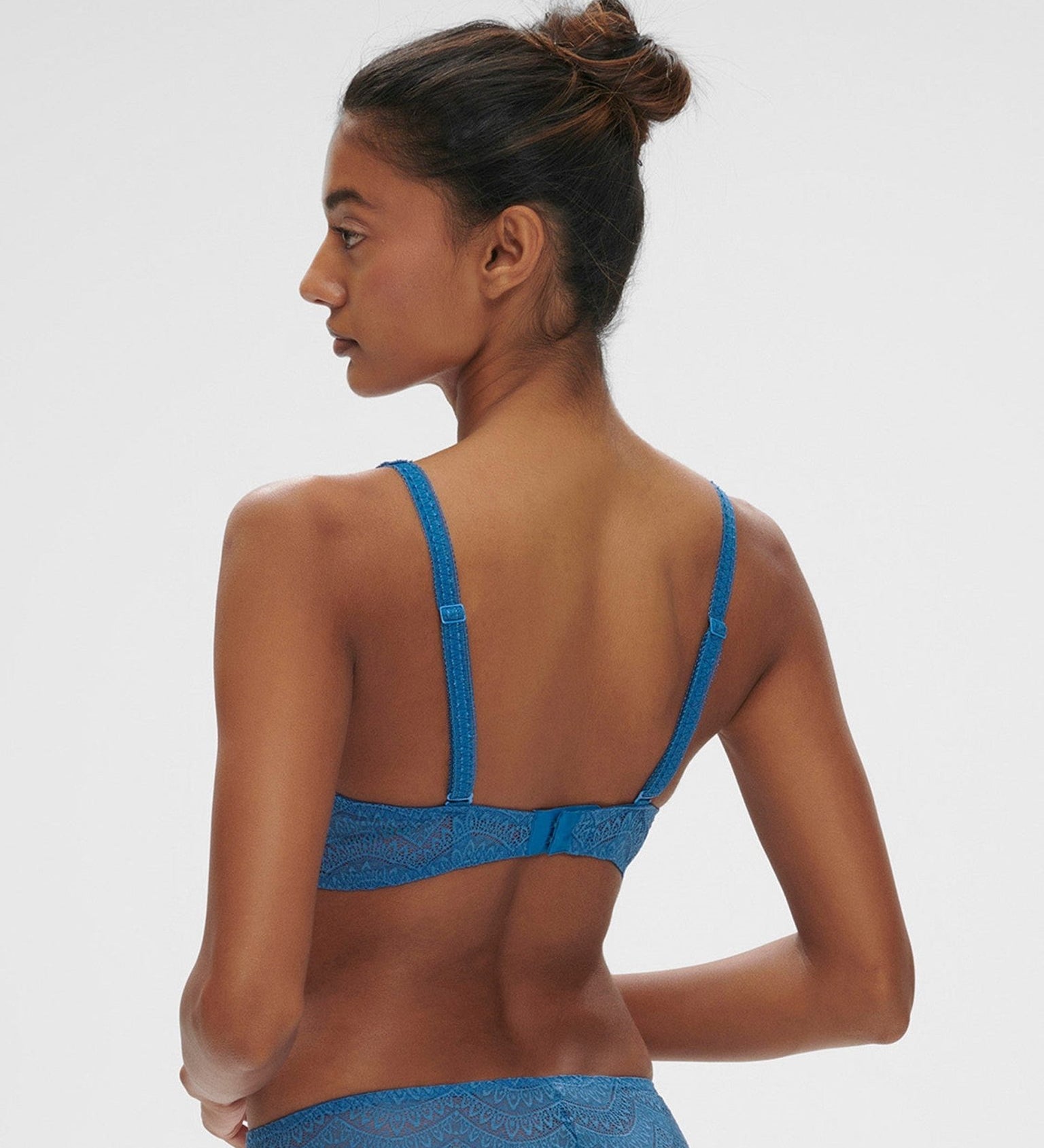 Back angle of the Karma Triangle Bra showing multiway straps and delicate lace band for a barely-there feel.