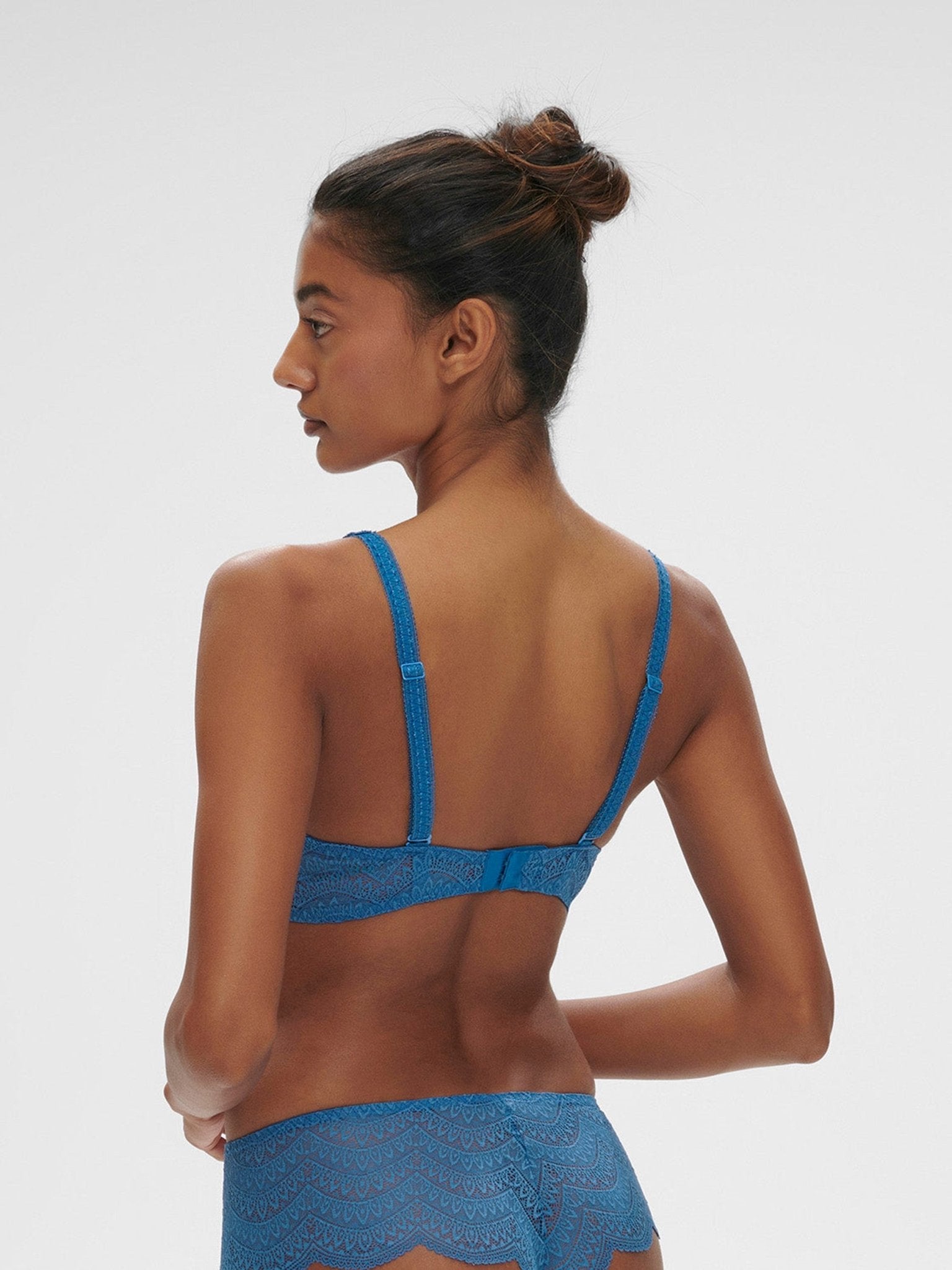 Back angle of the Karma Triangle Bra showing multiway straps and delicate lace band for a barely-there feel.