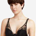 Front view of model wearing the Maddie Plunge T-Shirt Bra Black with floral lace and a low-cut neckline.