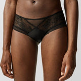 Front view of Maddie Shorty Brief in black, featuring lace overlay and striped tulle panels with opaque knit front.
