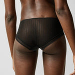Back view of Maddie Shorty Brief in black, showcasing sheer lace and soft tulle with a flattering, cheeky cut.