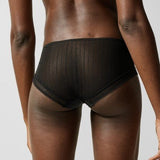 Back view of Maddie Shorty Brief in black, showcasing sheer lace and soft tulle with a flattering, cheeky cut.