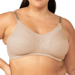 Model wearing the Lace Maternity Bra in beige, showcasing the soft drop-down cups and wide supportive straps.