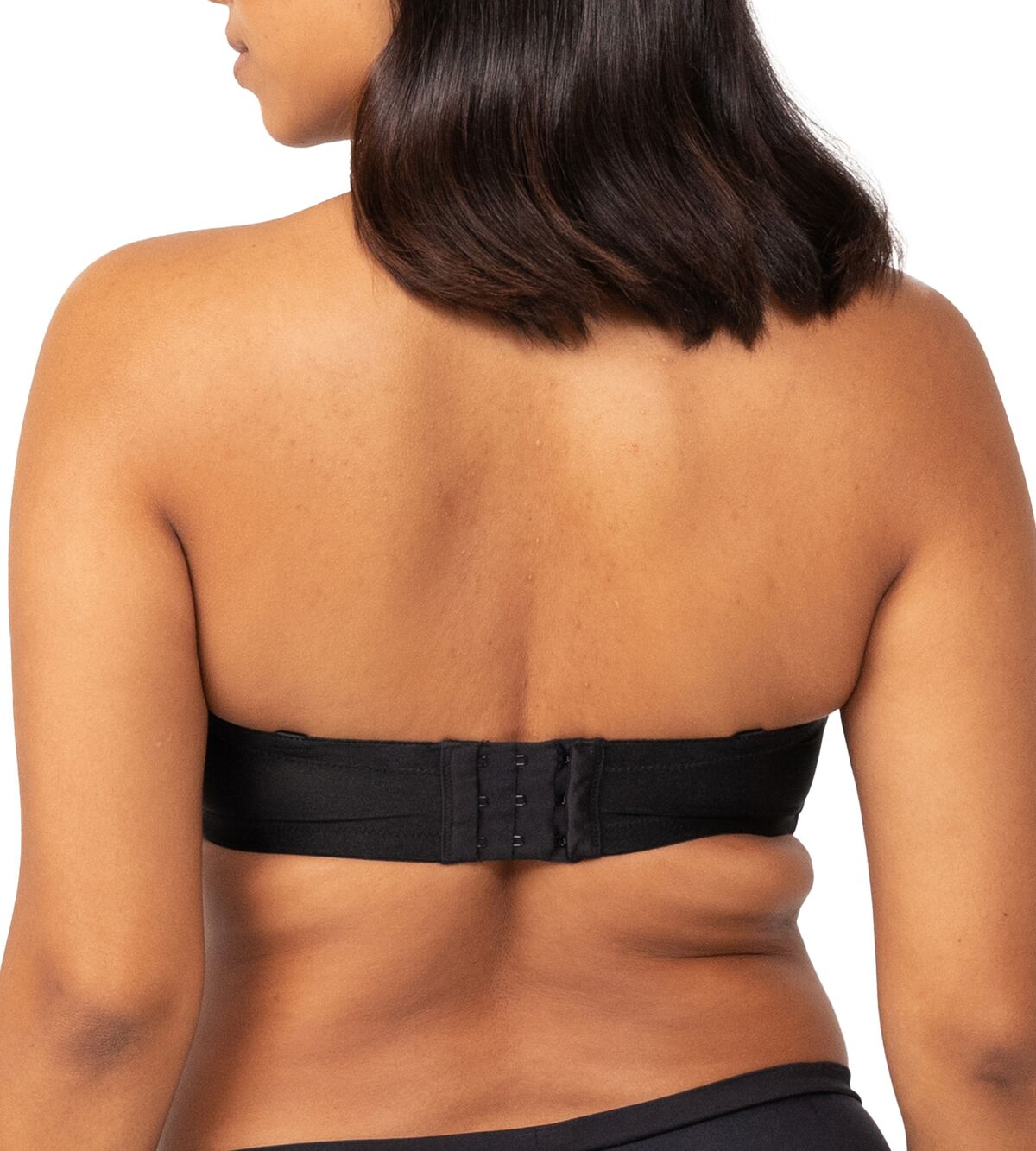Rear view of Triumph Strapless Bra in Black, featuring silicone grip and supportive band available from The Foundation.