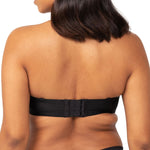 Rear view of Triumph Strapless Bra in Black, featuring silicone grip and supportive band available from The Foundation.