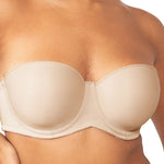 Close-up of nude strapless bra by Triumph with moulded cups and sleek silhouette—shop now at The Foundation.