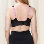 Back view of Triaction Control Lite Black sports bra, highlighting Dynamic Light® fabric and supportive design