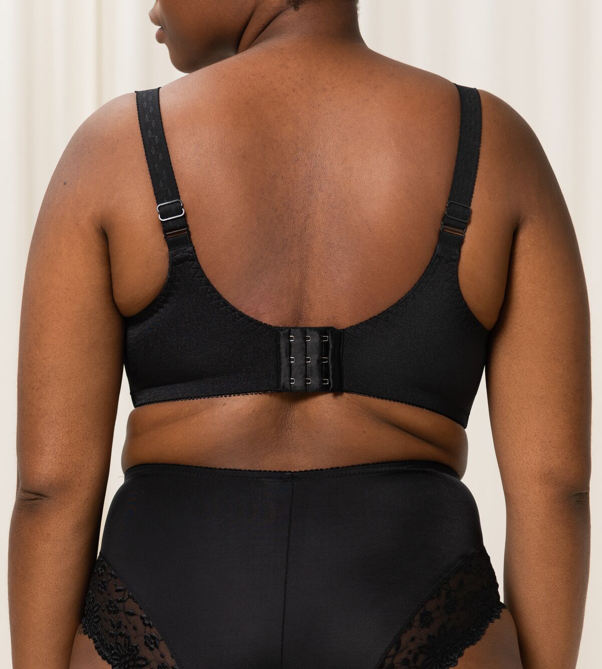 Back view of Ladyform Soft WX Bra Black, displaying supportive wide wings and secure hook closure