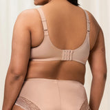“Back view of the Triumph Ladyform Soft WX Bra in Smooth Skin, featuring adjustable straps and smooth back support.