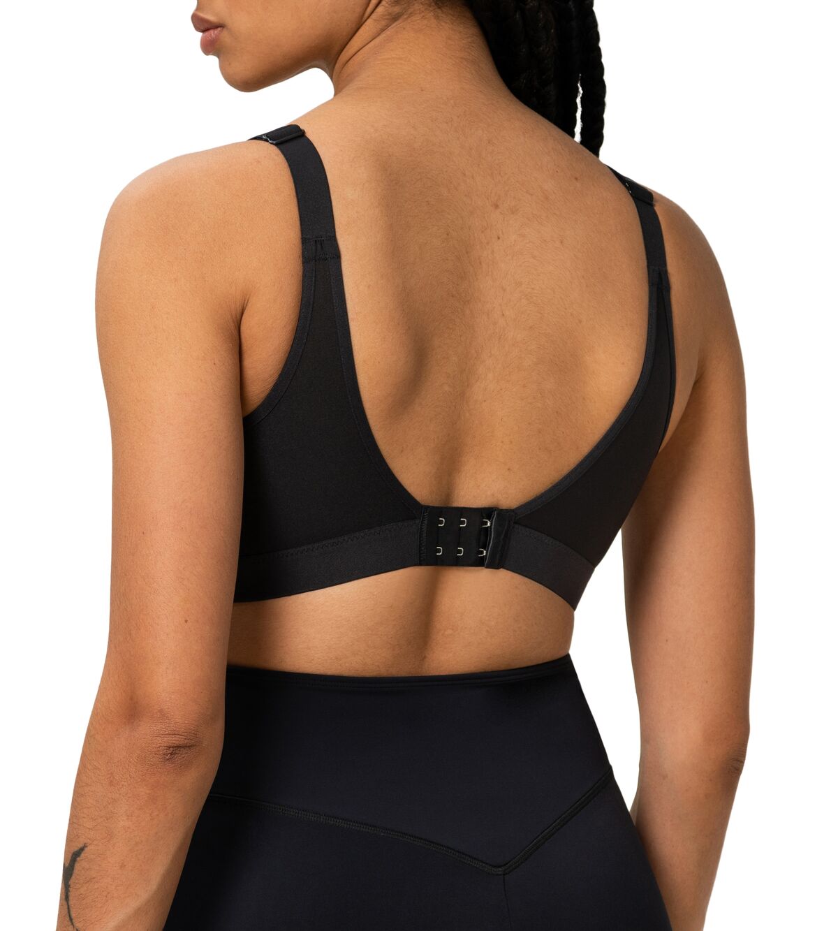 Back view of Triaction Wellness Sports Bra by Triumph in Black, showing adjustable straps and full coverage—available at The Foundation.