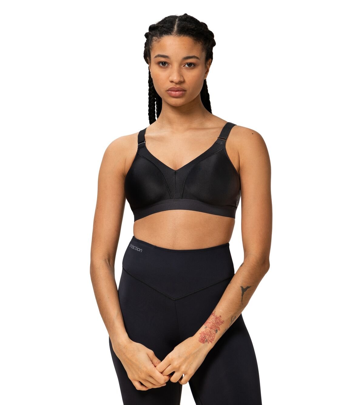 Model wearing full Triaction Wellness set in Black by Triumph, perfect for yoga or pilates—exclusive to The Foundation.