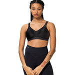 Model wearing full Triaction Wellness set in Black by Triumph, perfect for yoga or pilates—exclusive to The Foundation.