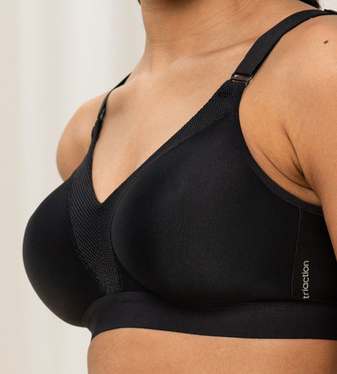 Close-up side profile of the Triaction Wellness Bra in Black by Triumph, with breathable mesh lining—shop now at The Foundation.