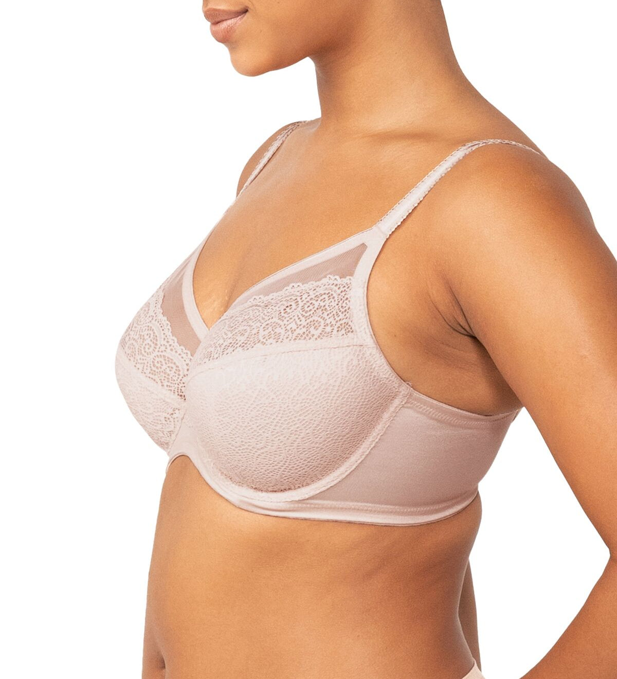 Side view of Triumph’s nude pink Sheer Minimiser Bra, showing soft cup structure and geometric lace—exclusively at The Foundation.